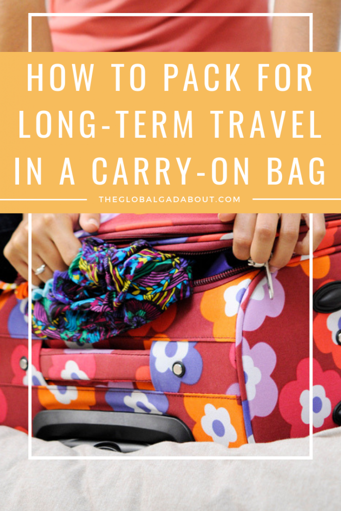 I travel for long periods of time and I hate checking a bag. Over years of practice, I've gotten packing for 6 months in a carry-on suitcase down to a science! Click to find out how I do it and get tips for packing more in less space. #travel #travelblog #theglobalgadabout #traveltips #packingtips #packinglist