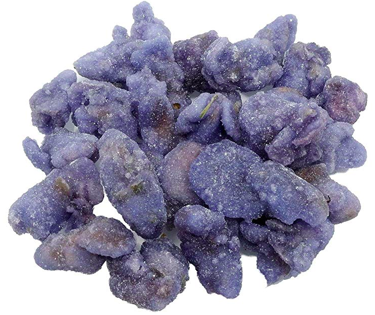 A pile of purple sugared violets candy.