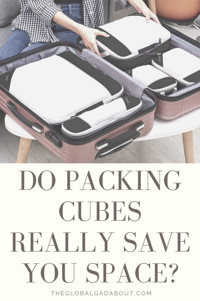 Open suitcase full of packing cubes. Hands are placing the last packing cube into the suitcase. Underneath are the words "Do Packing Cubes Really Save You Space? TheGlobalGadabout.com".