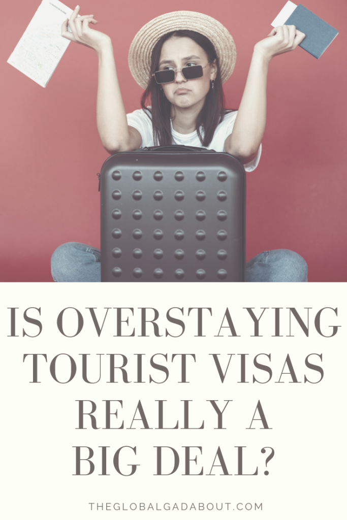 An upset-looking young woman sits behind her suitcase with a paper in one hand and passport in the other. Below are the words "Is Overstaying Tourist Visas Really a Big Deal?" and "TheGlobalGadbout.com"